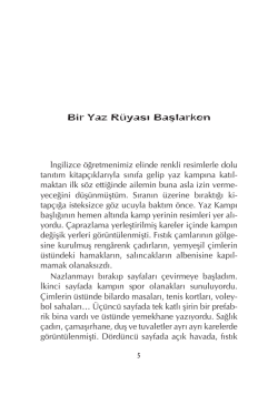 İngilizce &ouml;ğretmenimiz elinde renkli resimlerle dolu tanıtım