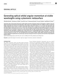 Generating optical orbital angular momentum at visible wavelengths