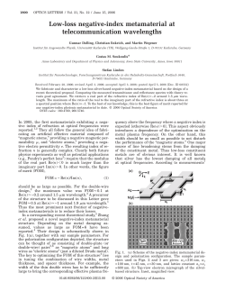 Low-loss negative-index metamaterial at telecommunication