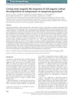 Living roots magnify the response of soil organic carbon