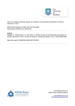 Continuum and atomistic description of excess electrons in TiO2