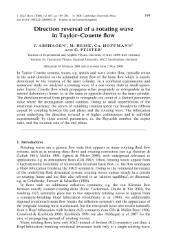 Direction reversal of a rotating wave in Taylor–Couette flow