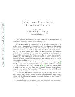 On the removable singularities of complex analytic sets