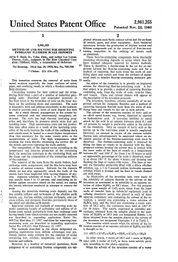 Method of and solvent for removing inorganic fluoride scale deposits