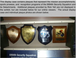 This display case contains plaques that represent the mission