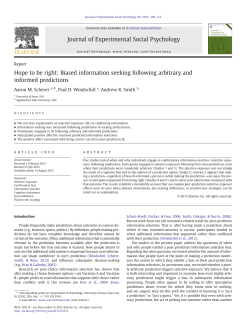 Hope to be right: Biased information seeking following arbitrary and
