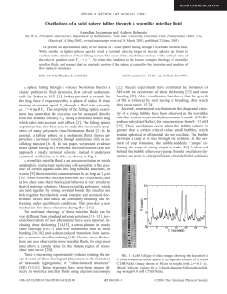 Oscillations of a solid sphere falling through a wormlike micellar fluid