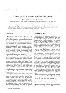 Friction and slip of a simple liquid at a solid surface
