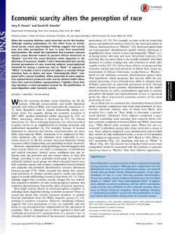 Economic scarcity alters the perception of race