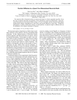 Particle Diffusion in a Quasi-Two-Dimensional Bacterial Bath