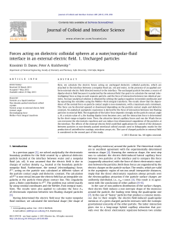 Forces acting on dielectric colloidal spheres at a water/nonpolar