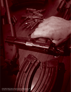 An arms dealer shows his wares, the prices of which rose