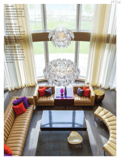 THIS PAGE Tiered wedding cake style chandeliers in the living room