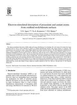 Electron-stimulated desorption of potassium and cesium atoms from