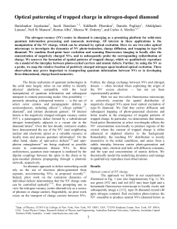 Optical patterning of trapped charge in nitrogen