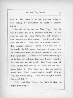 with it. She tosses it to and fro, now biting it,