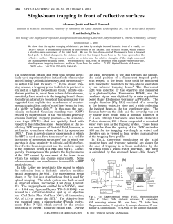 Single-beam trapping in front of reflective surfaces