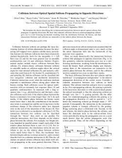 Collisions between Optical Spatial Solitons Propagating in Opposite
