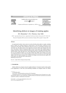 Identifying defects in images of rotating apples