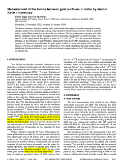 Measurement of the forces between gold surfaces in water by atomic