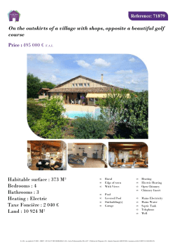 On the outskirts of a village with shops, opposite a