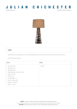 A cylindrical glass lamp on an aged gold base with a striking hand