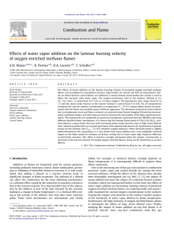 Effects of water vapor addition on the laminar burning velocity of
