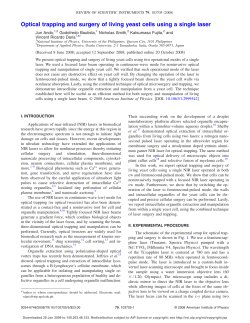 Optical trapping and surgery of living yeast cells using a single laser