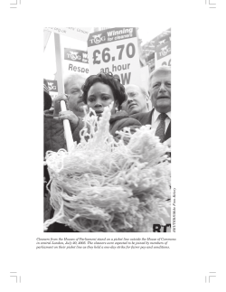 Cleaners from the Houses of Parliament stand on a picket line