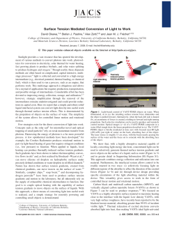 Surface Tension Mediated Conversion of Light to Work