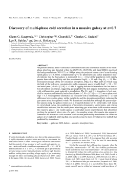Discovery of multi-phase cold accretion in a massive galaxy at z=0.7