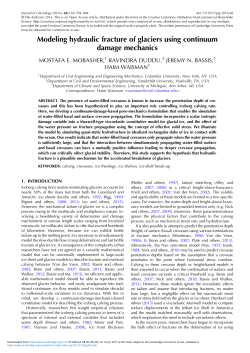 Modeling hydraulic fracture of glaciers using continuum damage