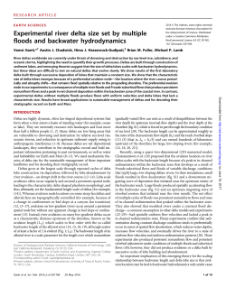 Experimental river delta size set by multiple floods and backwater