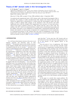 Theory of 360&deg; domain walls in thin ferromagnetic films