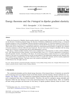 Energy theorems and the J-integral in dipolar gradient