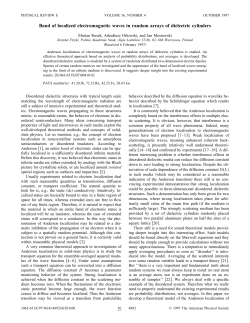 Band of localized electromagnetic waves in random arrays of