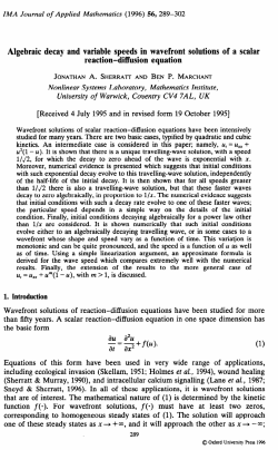 Algebraic decay and variable speeds in wavefront solutions of a