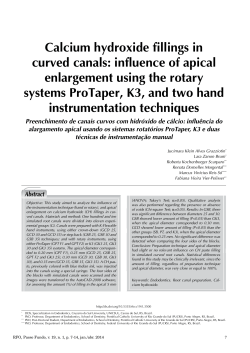 Calcium hydroxide fillings in curved canals: influence of apical