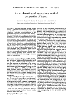 An explanation of anomalous optical properties of topaz