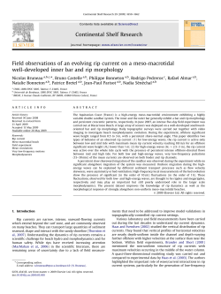 Field observations of an evolving rip current on a