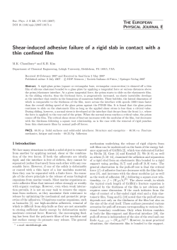 Shear-induced adhesive failure of a rigid slab in