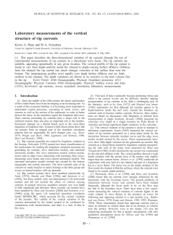 Laboratory measurements of the vertical structure of rip currents