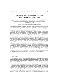Flow past a square-section cylinder with a wavy stagnation
