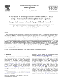 Conversion of municipal solid waste to carboxylic acids using a
