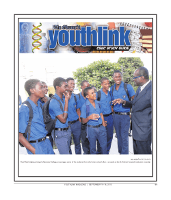 Ruel Reid (right), principal of Jamaica College, encourages some of