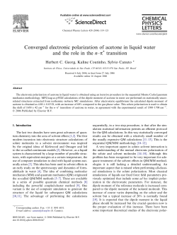 Converged electronic polarization of acetone in liquid water